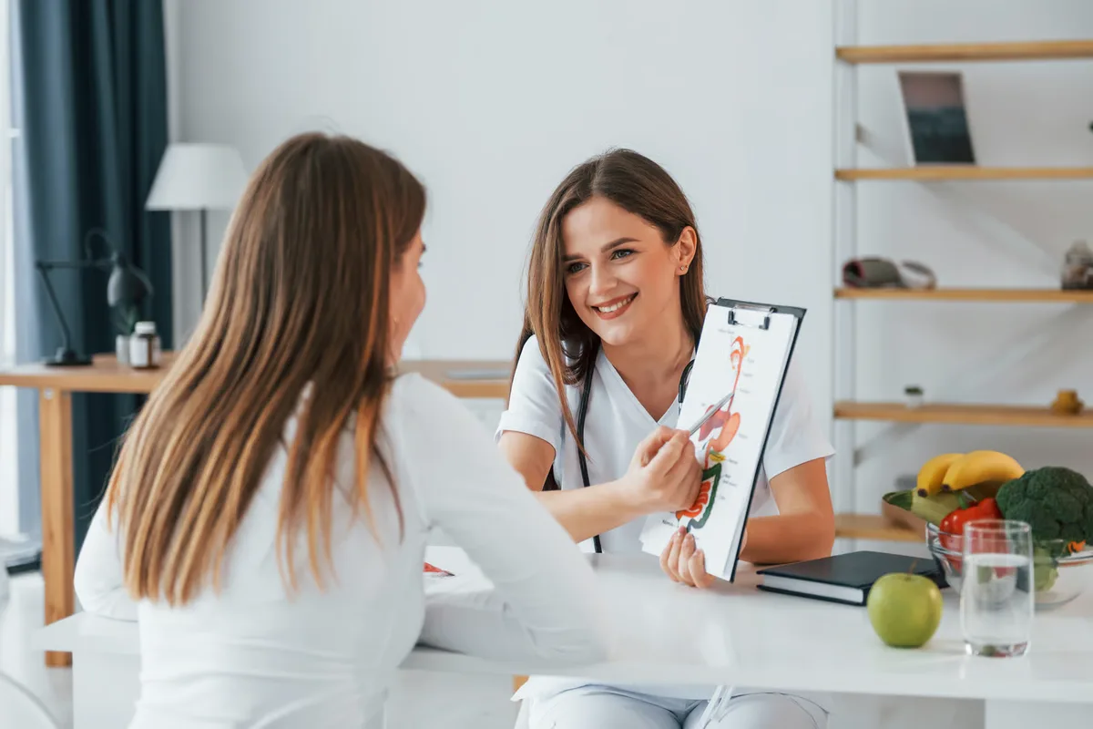 Dietitian explaining a meal plan to a patient