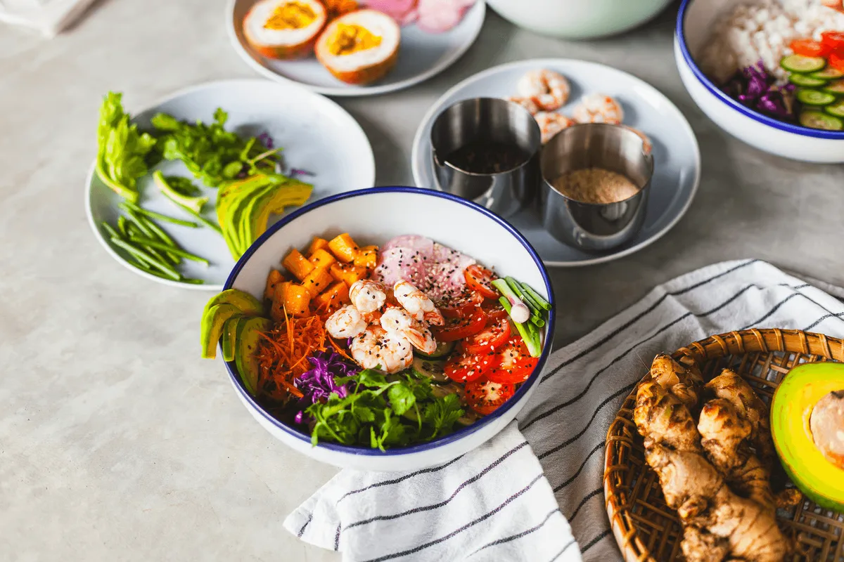 Bowls of vegetables, eggs and lean protein, an example of solid food after weight loss surgery