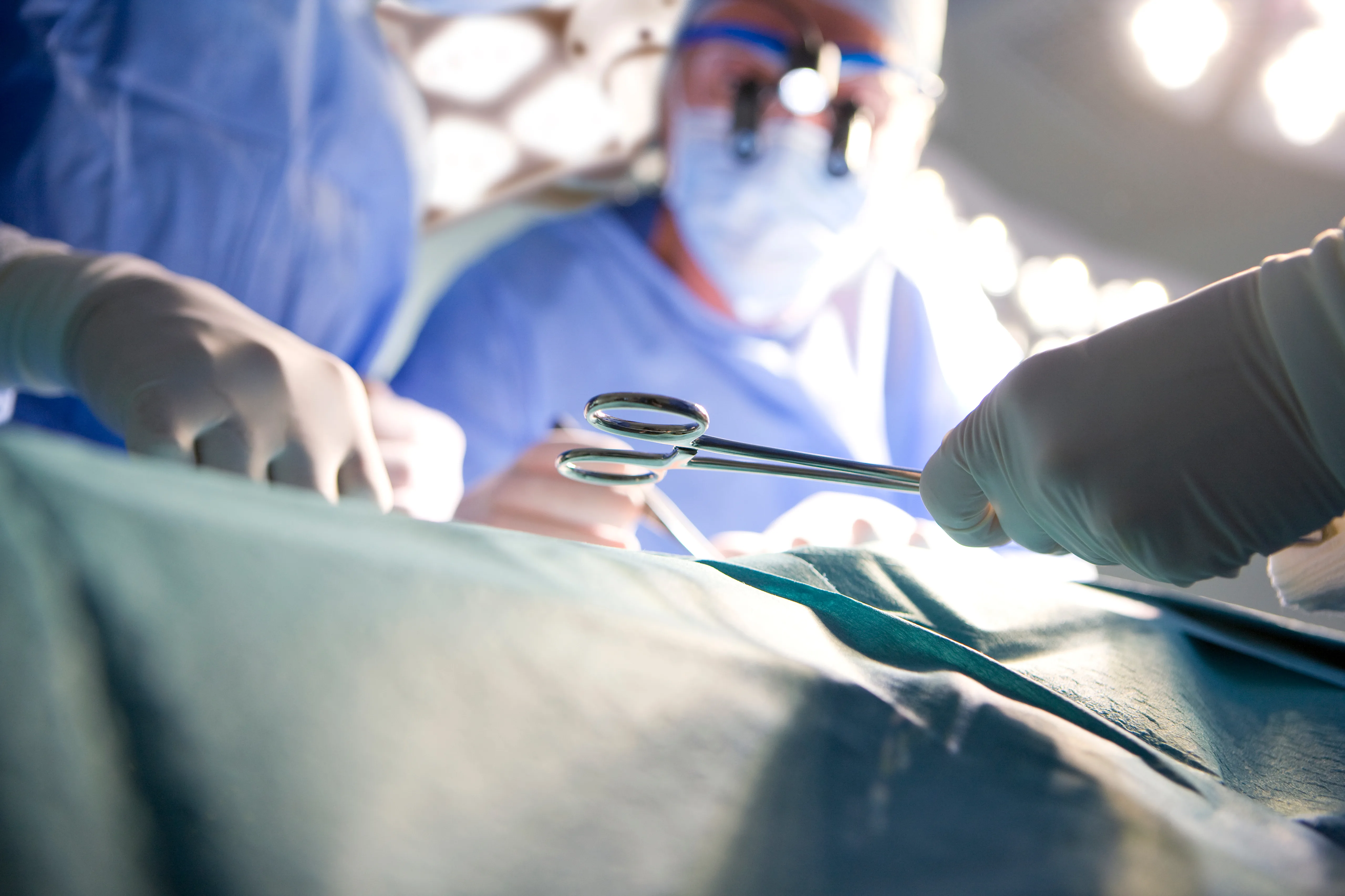 Surgical team operating in a theatre